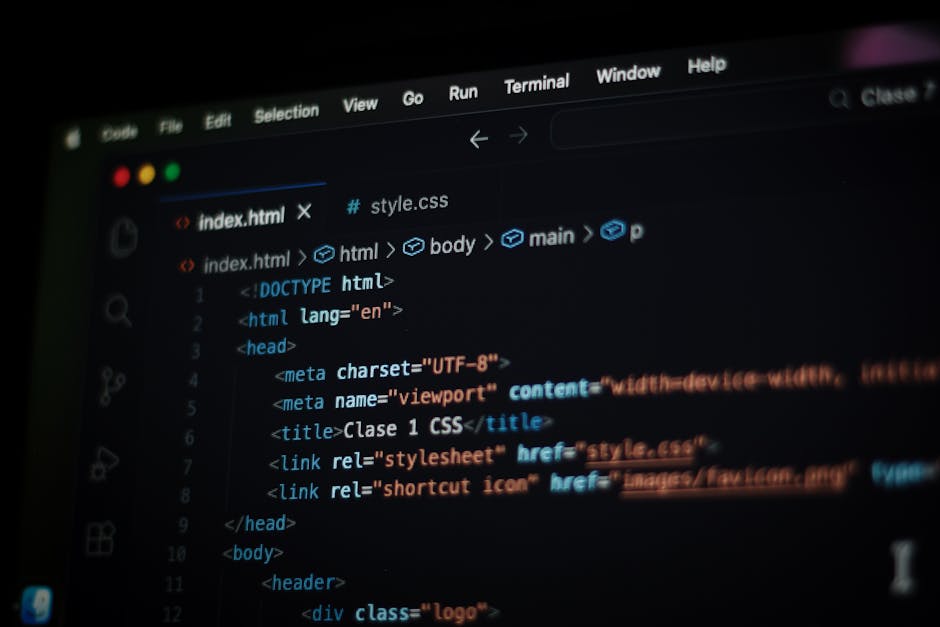 A close-up view of a laptop screen displaying a code editor with dark blue background. The code is written in JavaScript and includes HTML tags, with lines of syntax highlighting in blue, white, and l